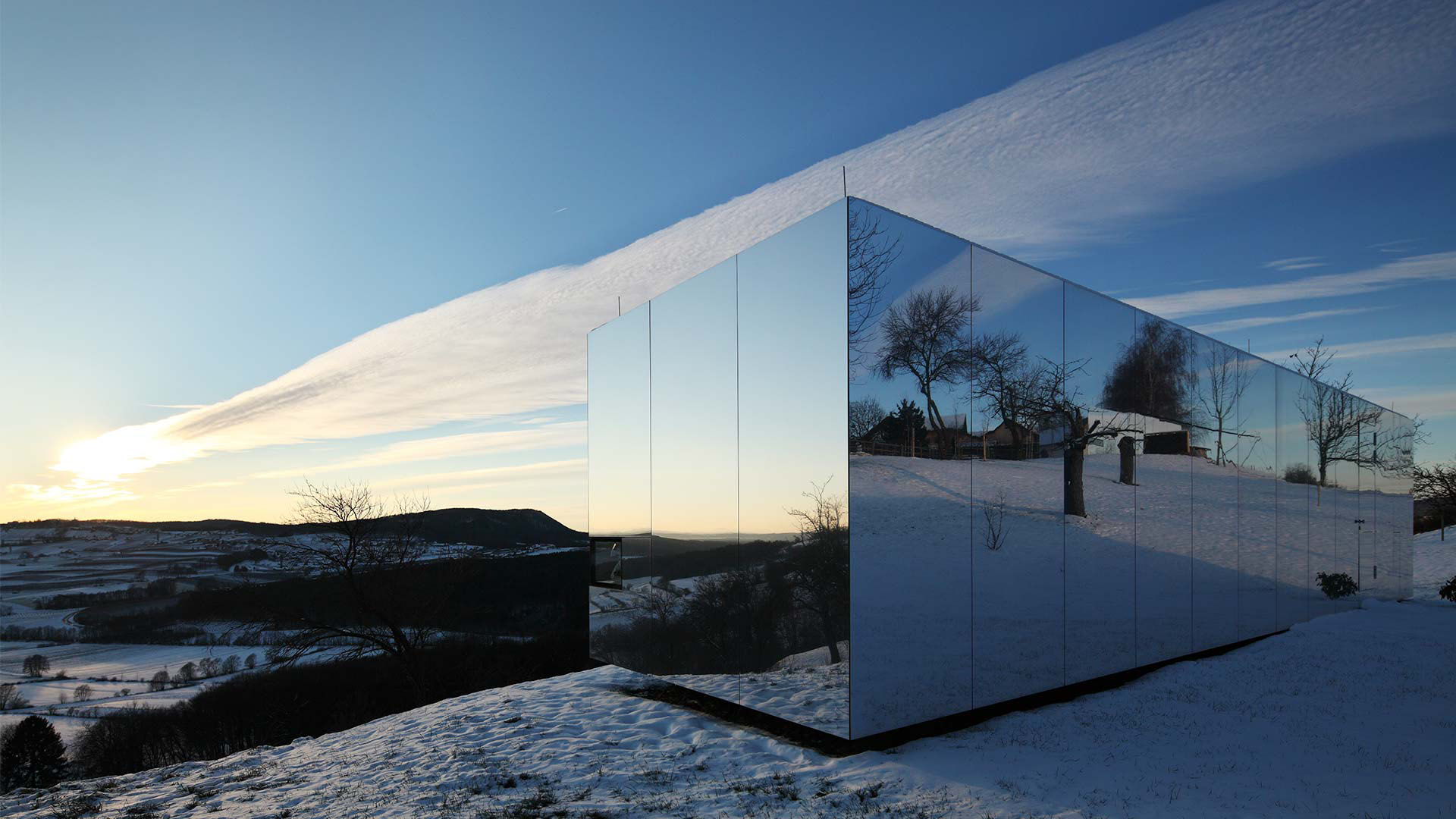 Mirrored Modular Housing Creates Casa Invisible in Austria